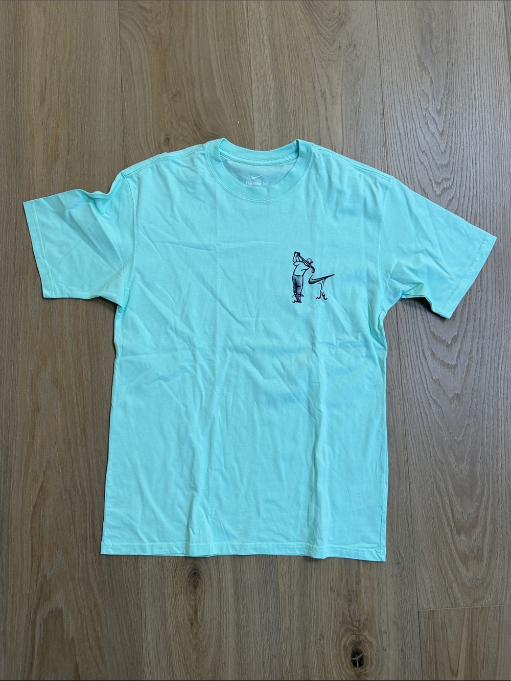 Men's Nike Loose Fit Crew Neck T-Shirt in Mint Green with Golf Graphic